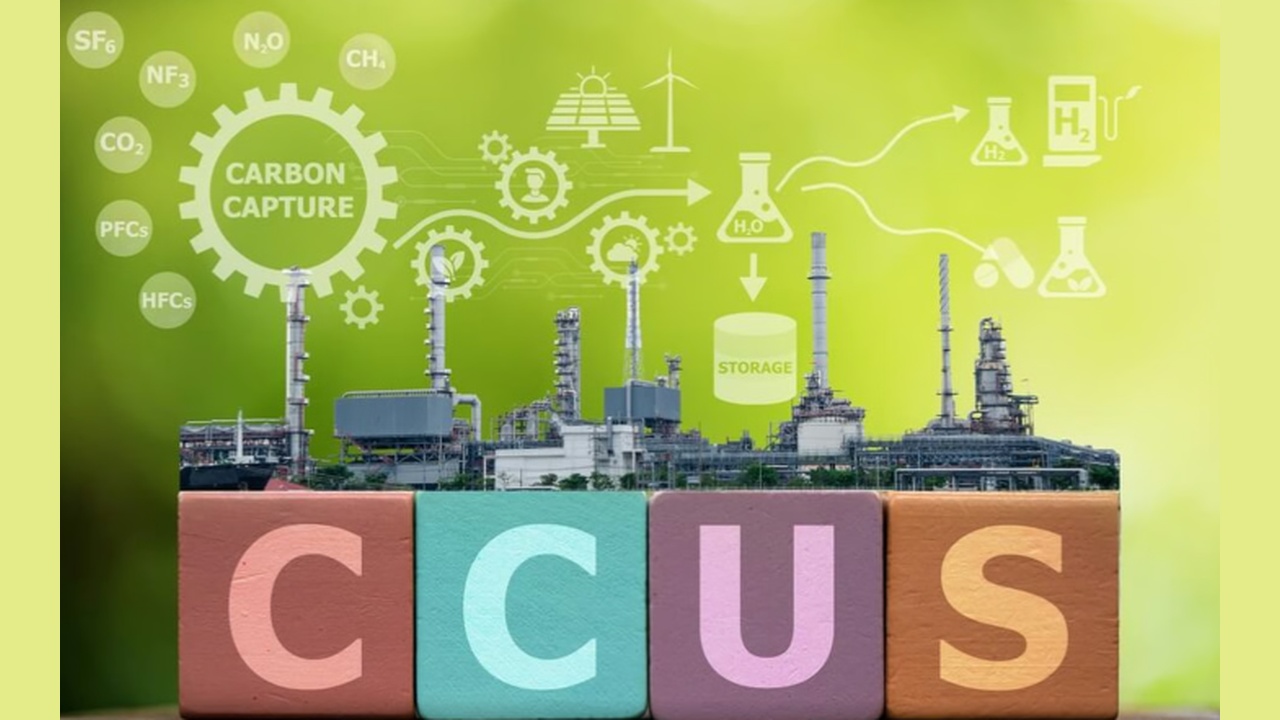 Industrial plant with colorful blocks spelling CCUS in the foreground and a carbon capture diagram in a green background, illustrating CCUS technology concept.